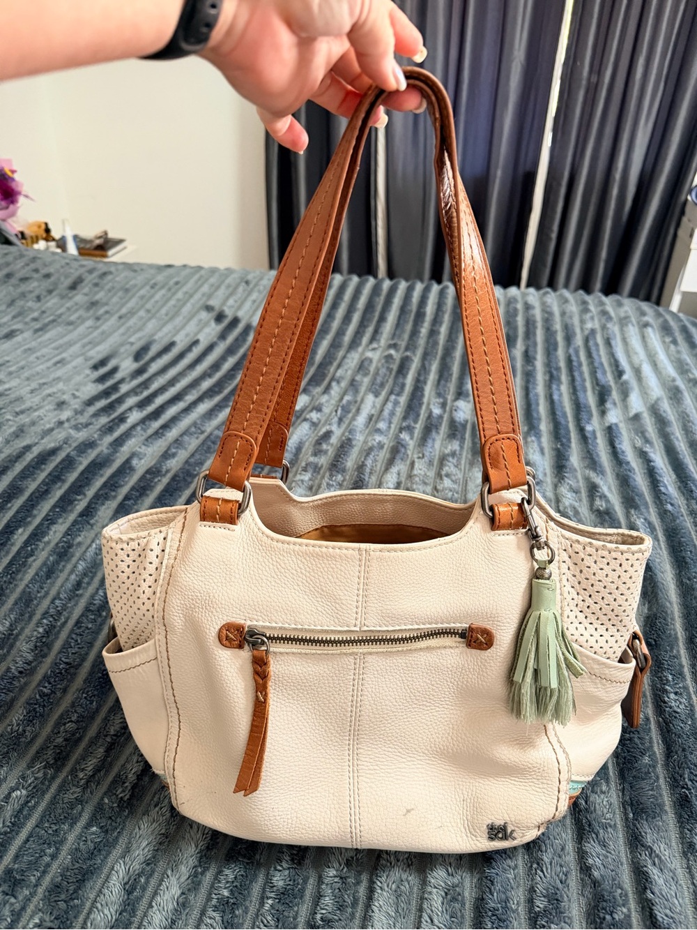 The Sak Cream Shoulder Bag with Tan Handles and Mint Tassel